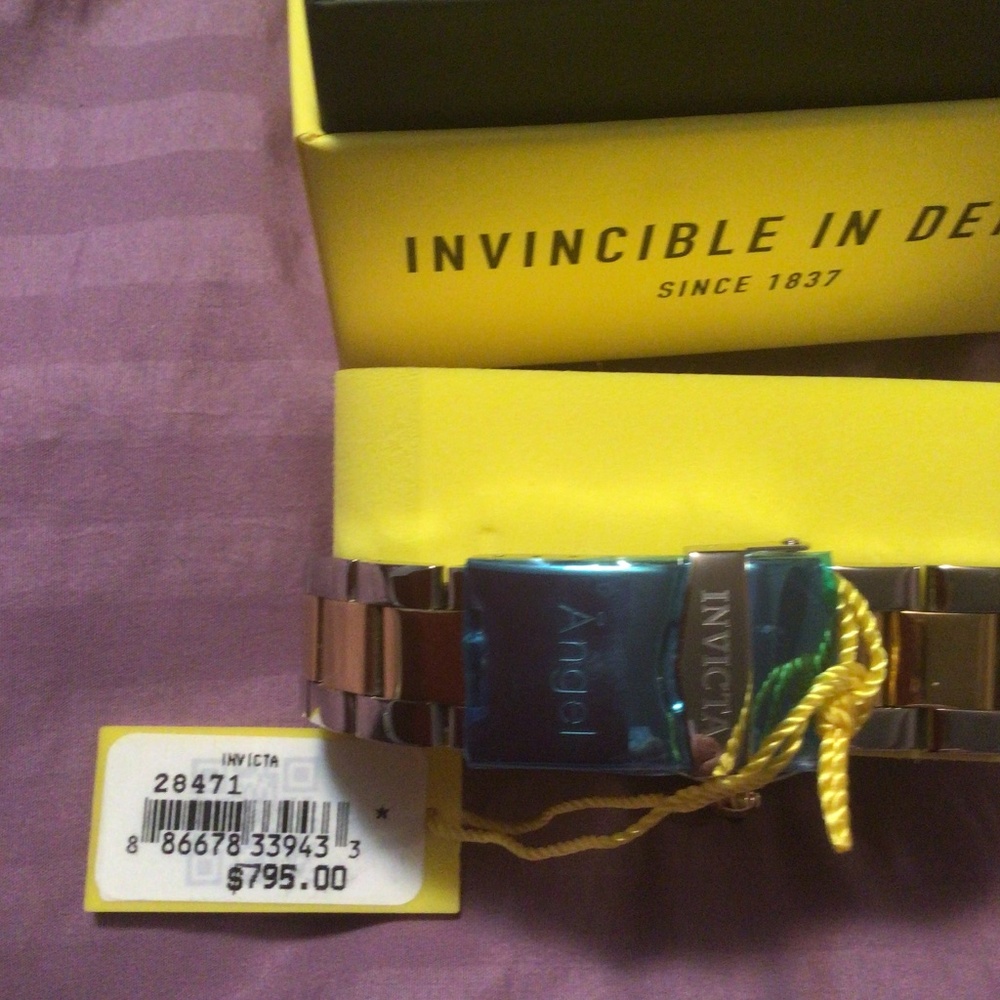 Invicta woman’s watch diamond surround dial
